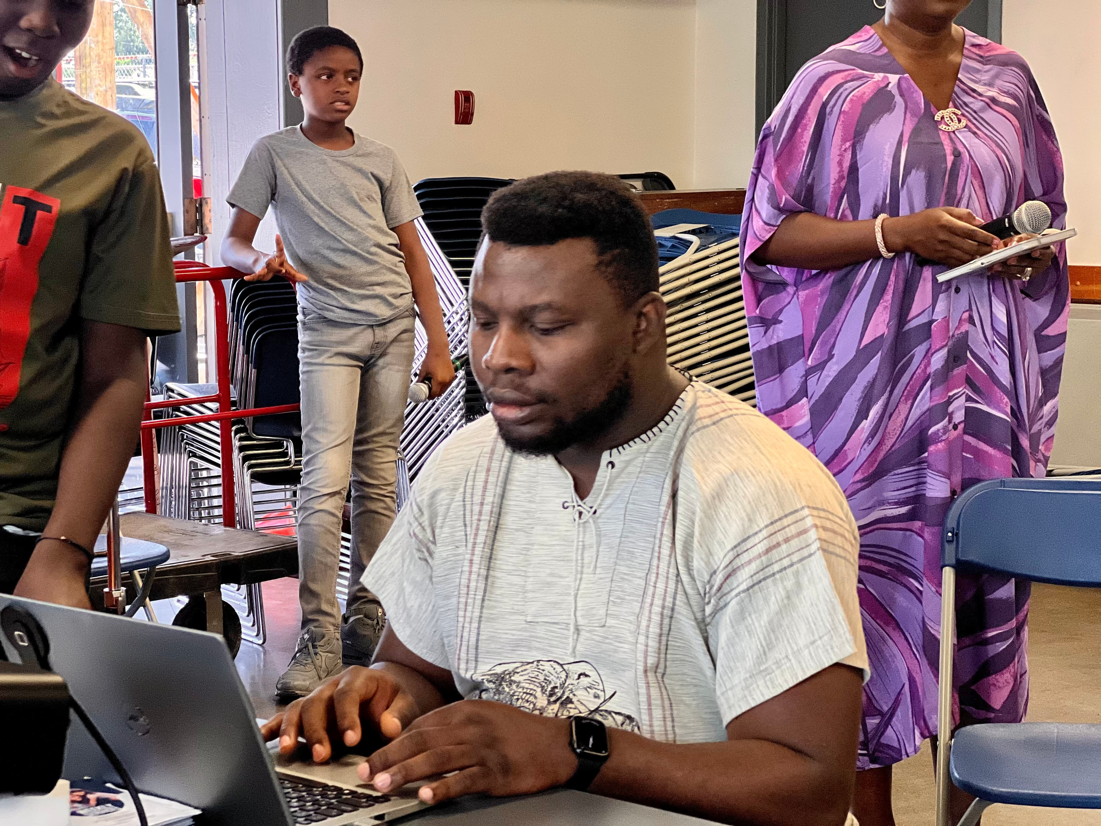 Joseph Aro at work in the field